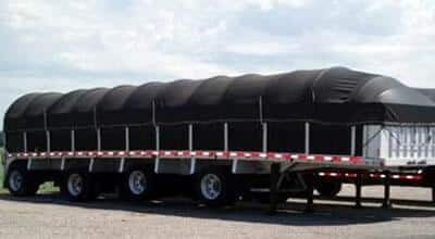 Sidekit trailer is shown in the image which is equipped with a panel made from either plywood or fiberglass