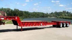 image of a red extendable double drop trailer